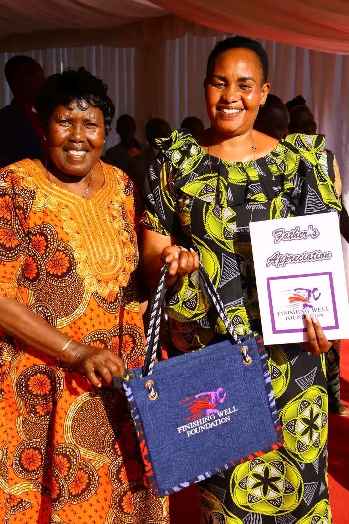 Rev. Dr. Rebecca Tuimising presenting a gift at a Finishing Well Foundation appreciation event