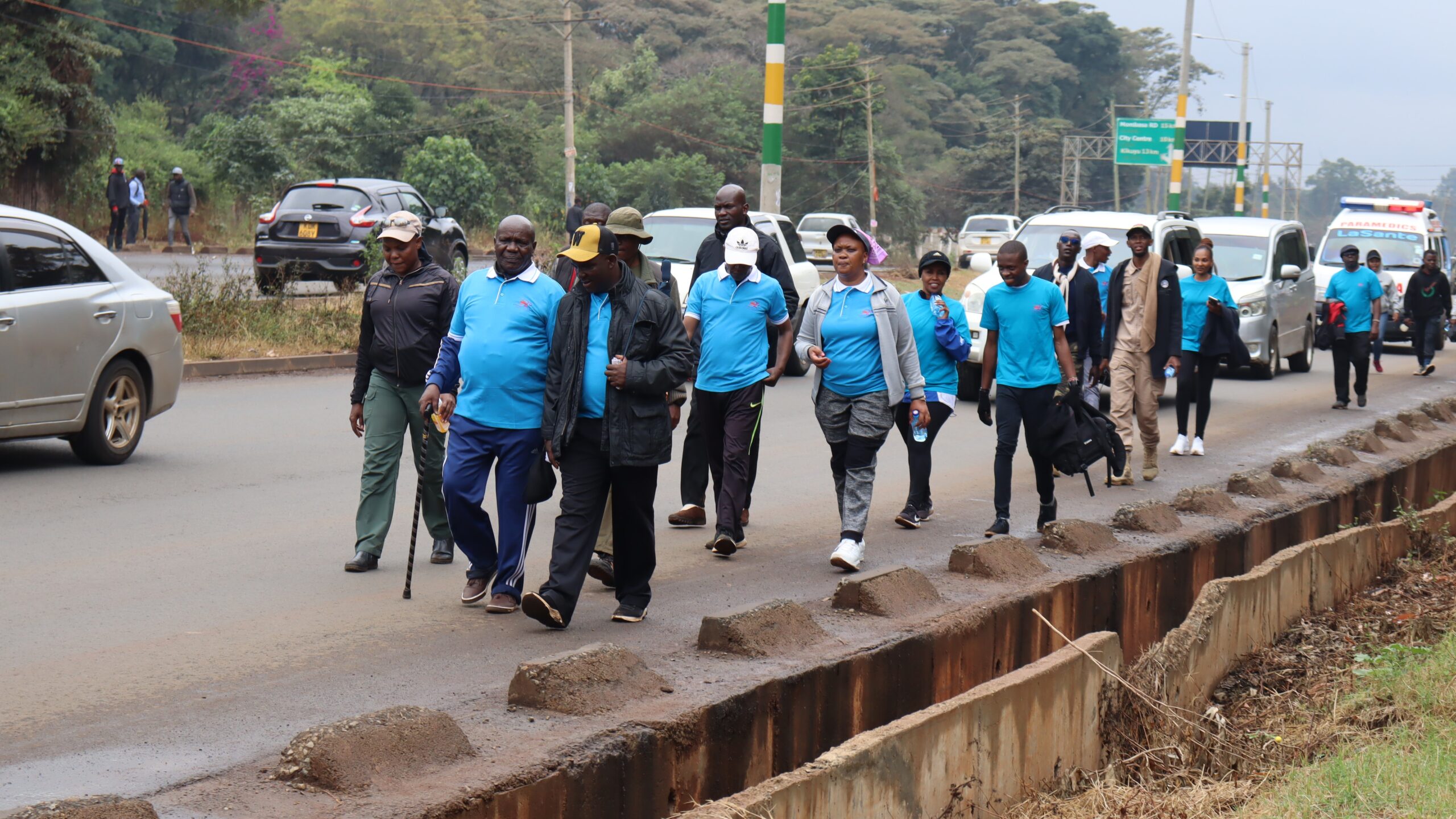 Bishop Walking with Team